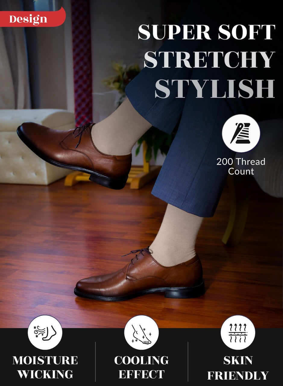 Beige dress shoes worn with blue pants on a wooden floor, with text highlighting shoe features.