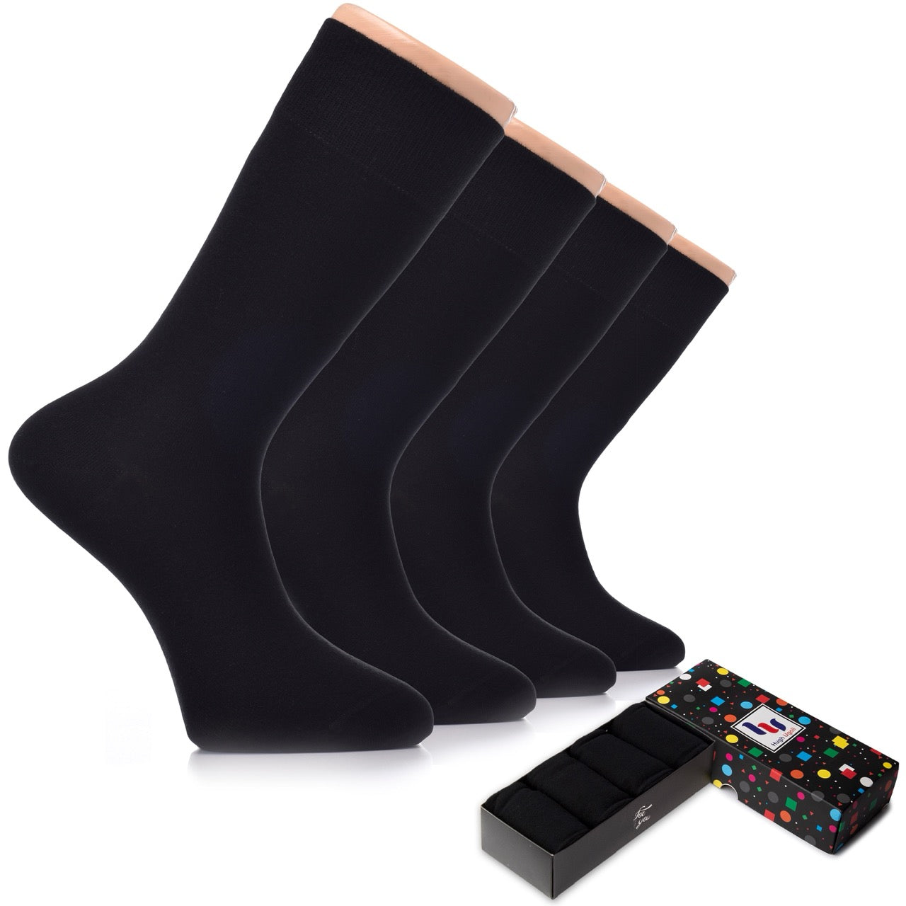 Set of black socks with a decorative box on a white background
