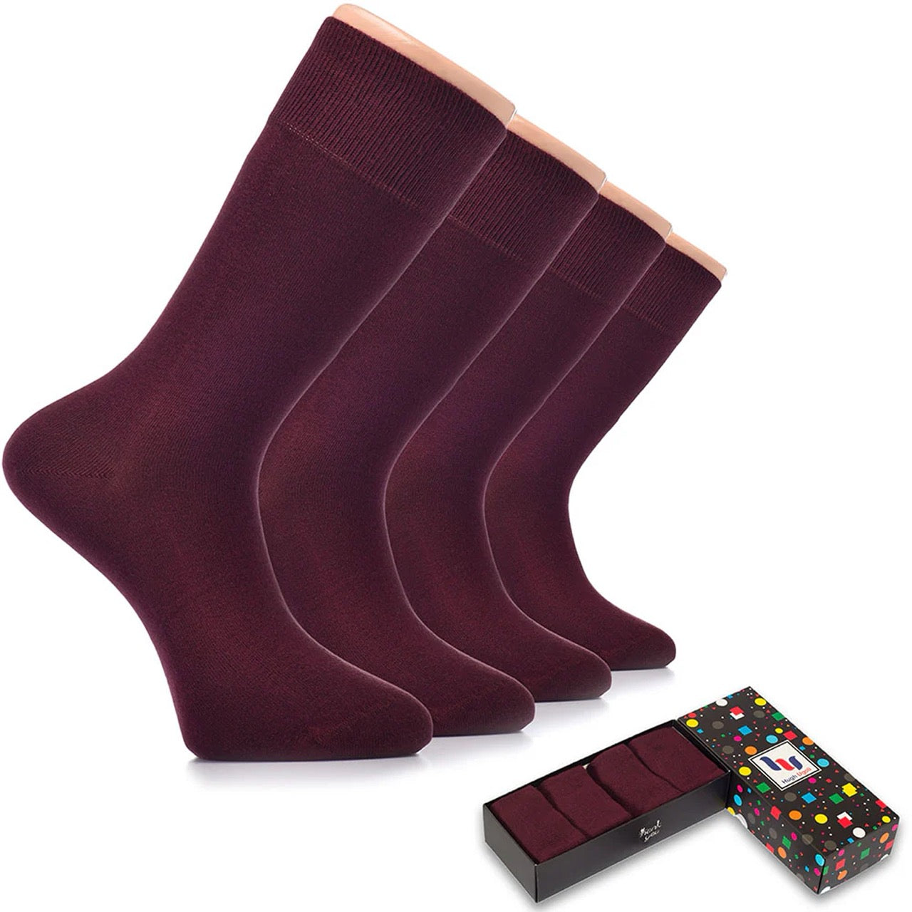Set of burgundy socks with a black box and colorful polka dot box in the background