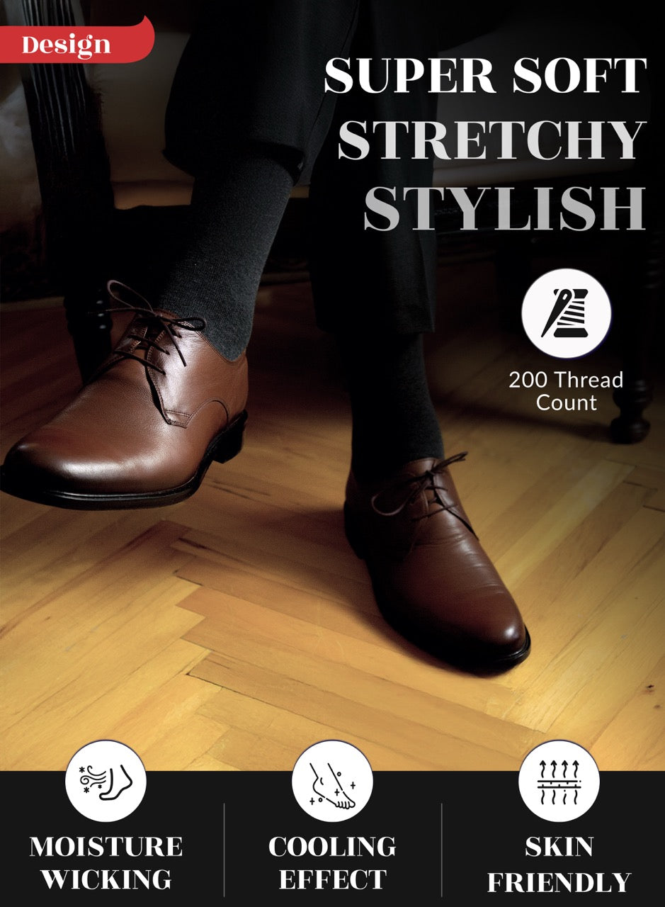 Charcoal socks with brown leather shoes worn with dark pants on a wooden floor, featuring text about shoe features.