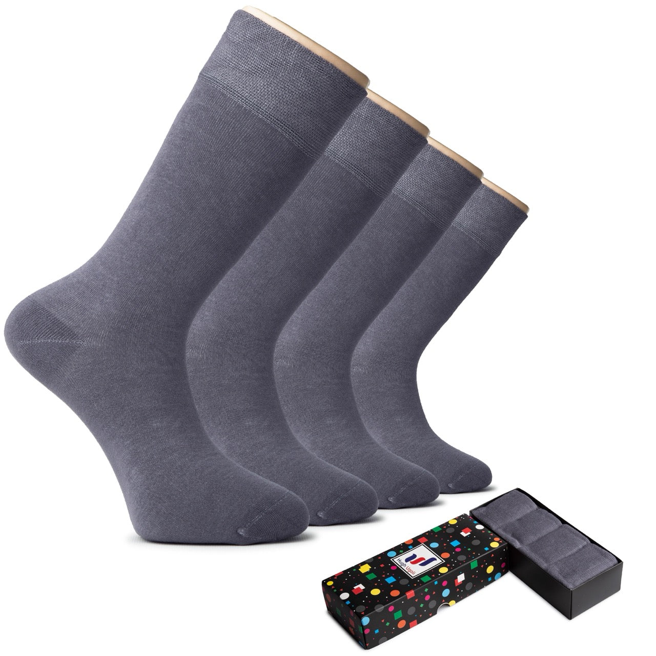 Set of gray socks with a black box featuring colorful polka dots on a white background