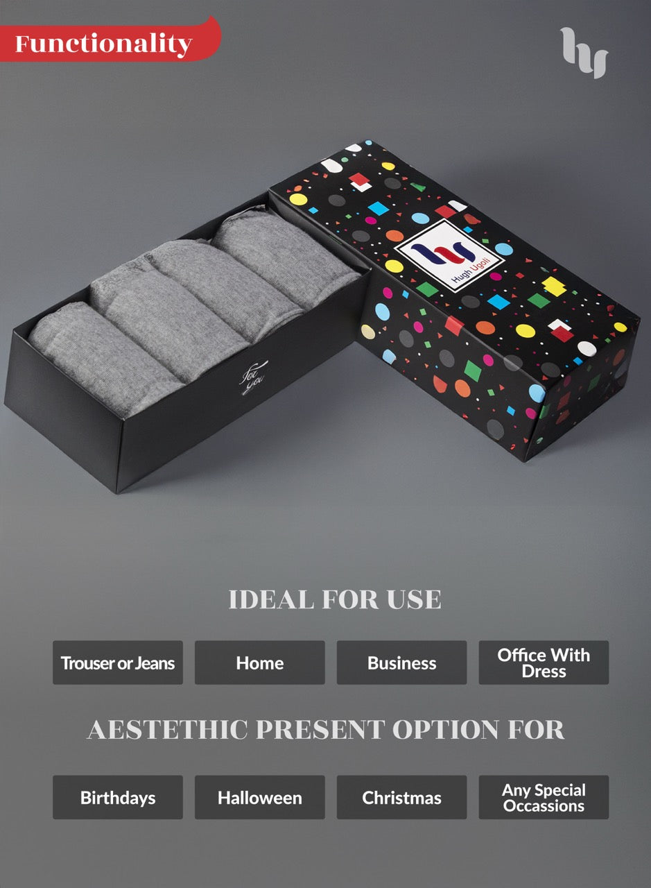 Light Gray socks in a colorful polka dot box on a gray background