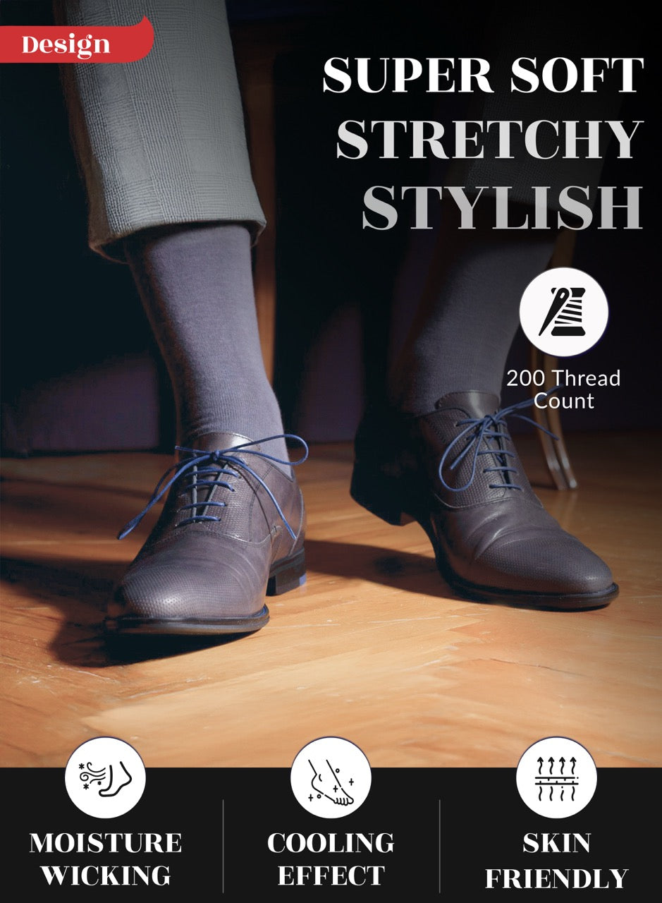 Person wearing gray dress shoes and Smoke gray socks on a wooden floor with text highlighting features.