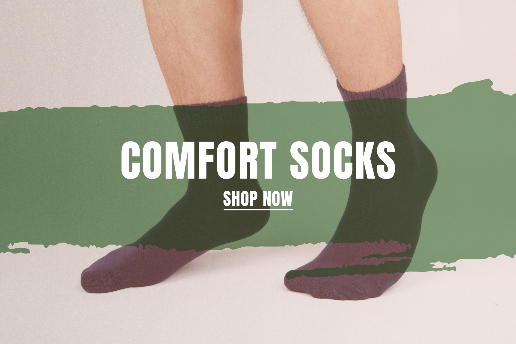Hugh Ugoli - Men Socks - Close-up of legs wearing dark green and purple crew socks with a comfort socks promotional message on a minimalist background.