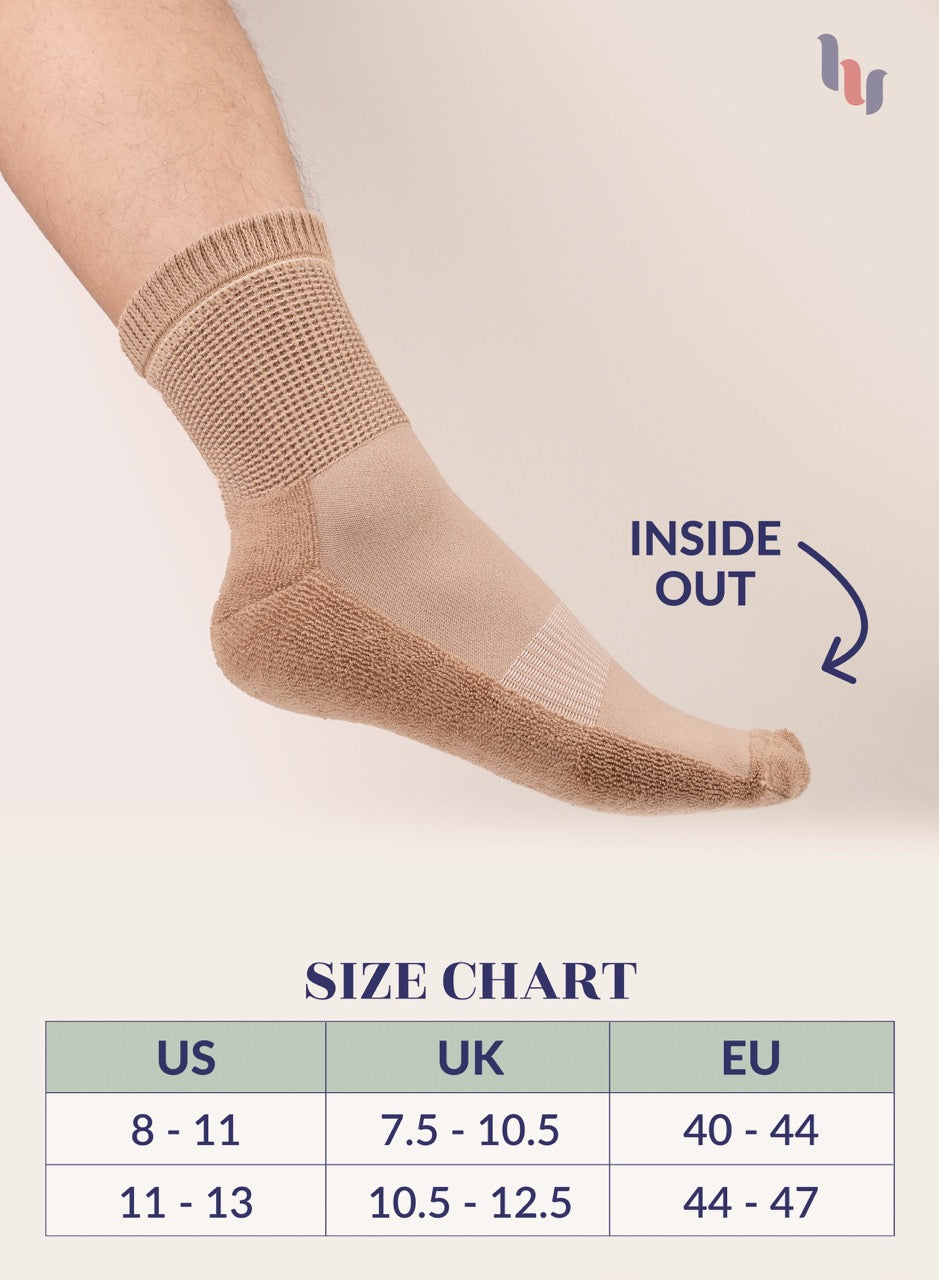Beige sock with size chart on a light background