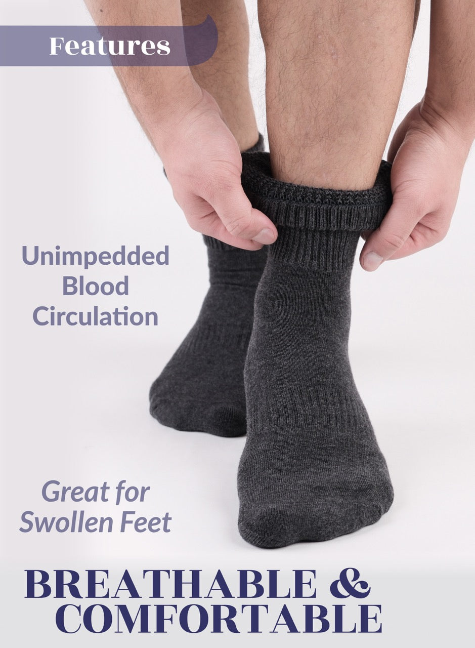 Person wearing dark gray socks with text highlighting features on a white background