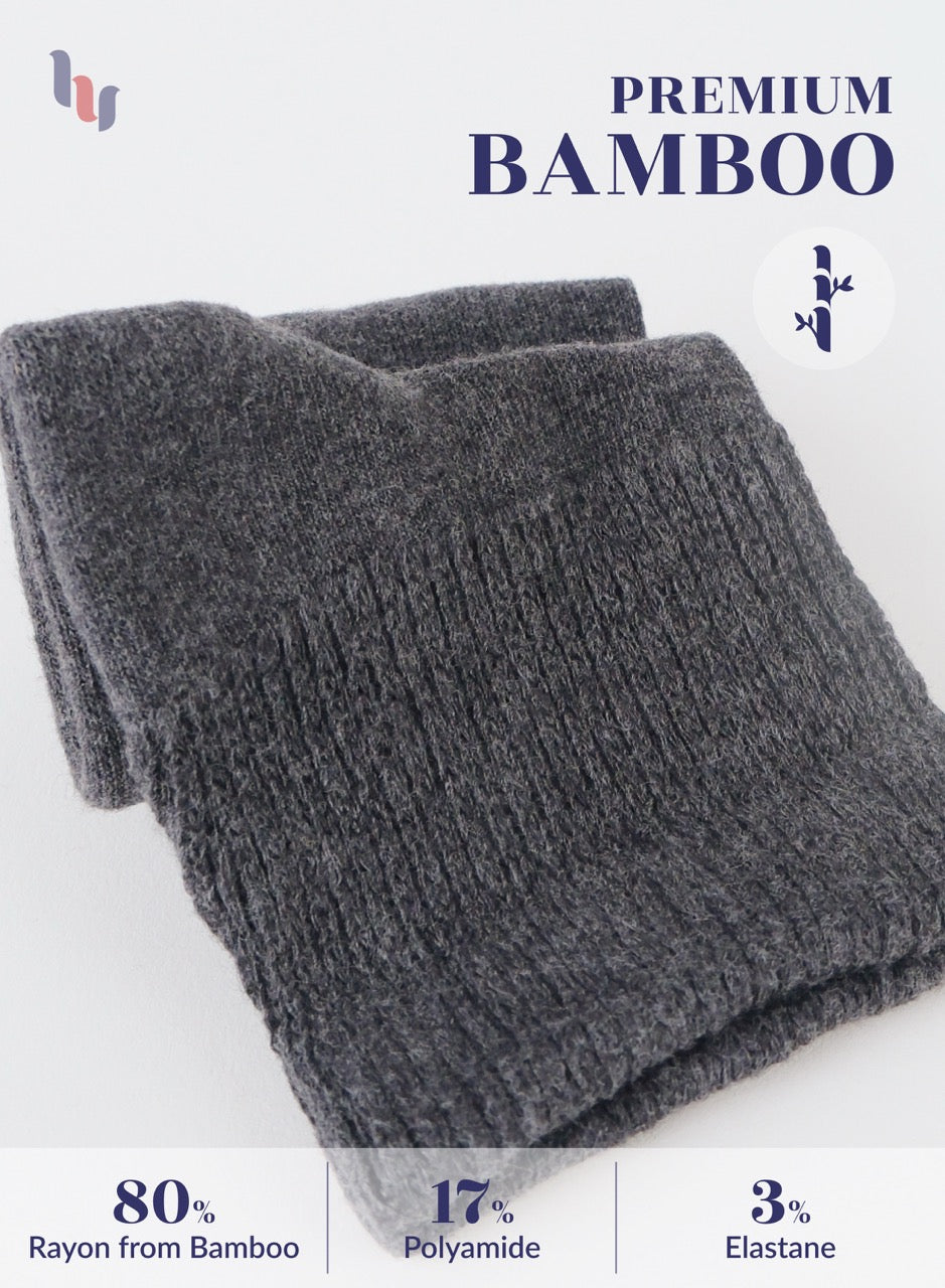 Gray folded fabric with bamboo content information on a white background