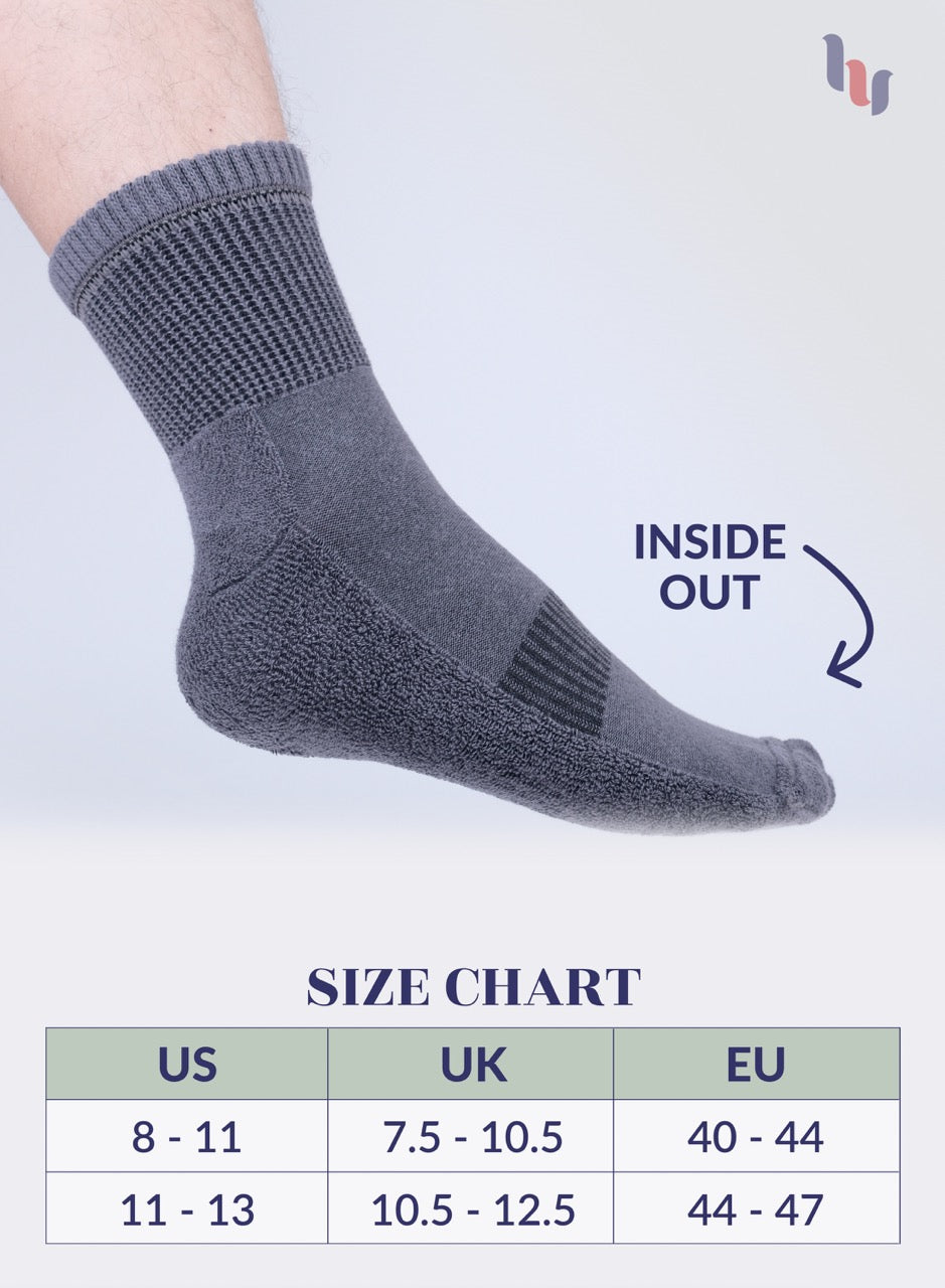 Gray sock with size chart on a light gray background
