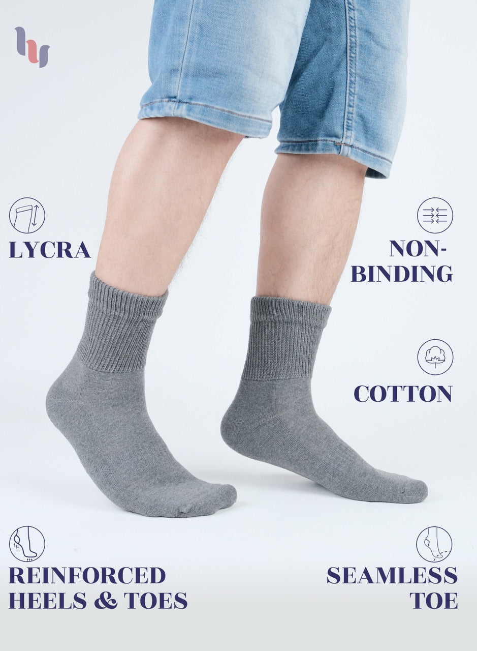 Light Gray socks worn with denim shorts on a white background, featuring LYCRA and cotton text.