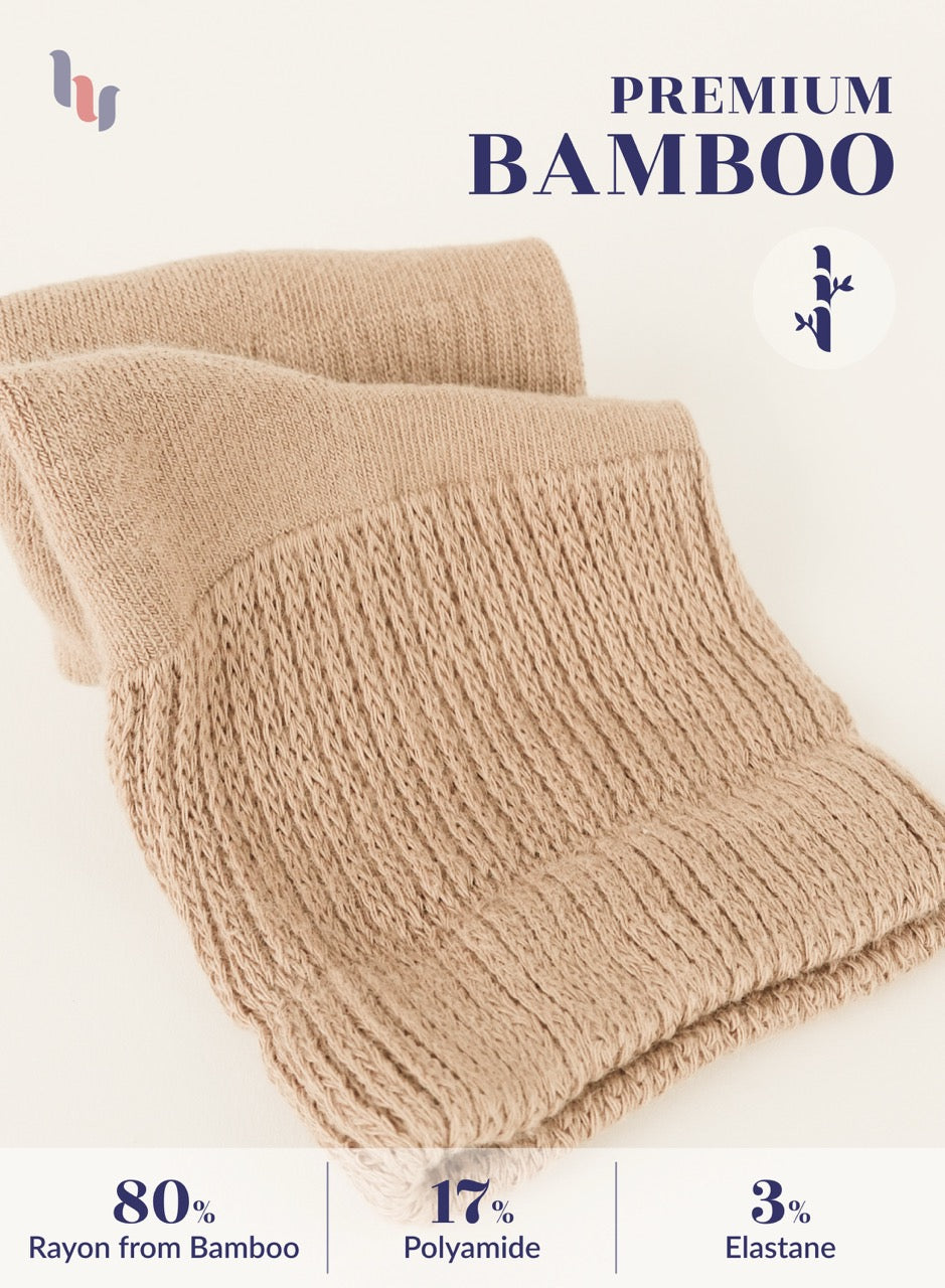 medium Beige knitted scarf with bamboo text and material composition on a white background