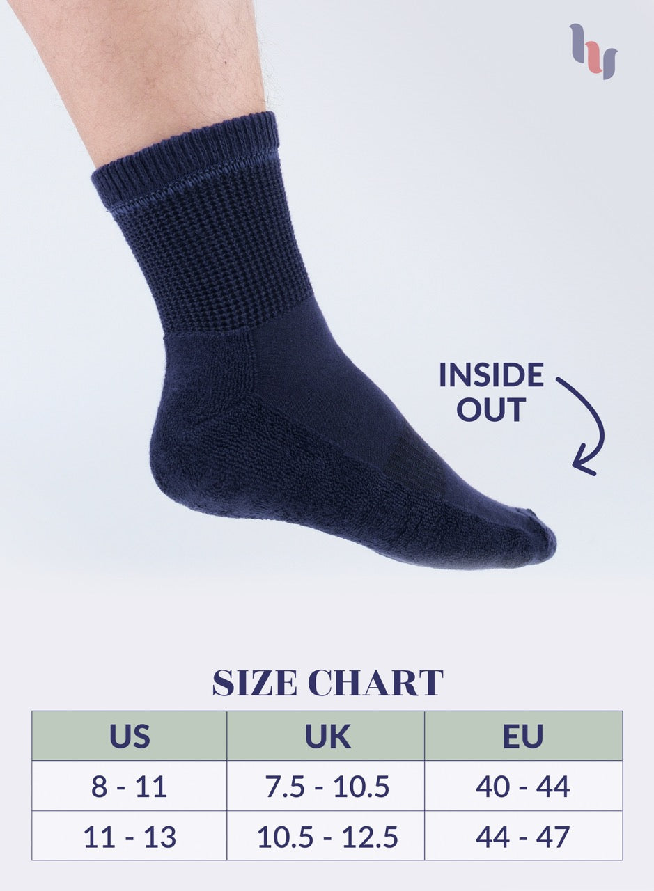 Navy blue sock with size chart on a light gray background