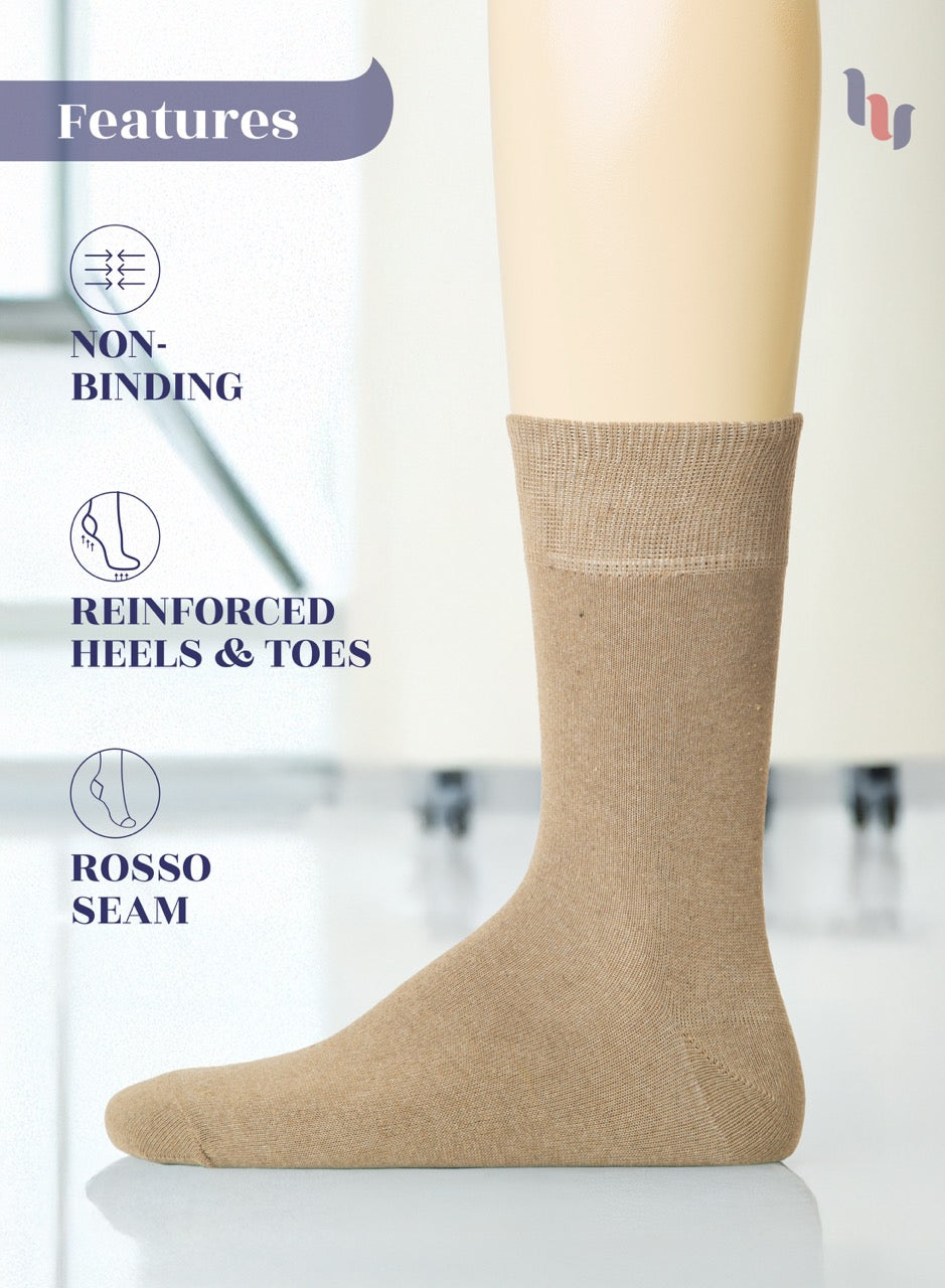 Beige sock on a leg with features listed on the left, against a neutral background