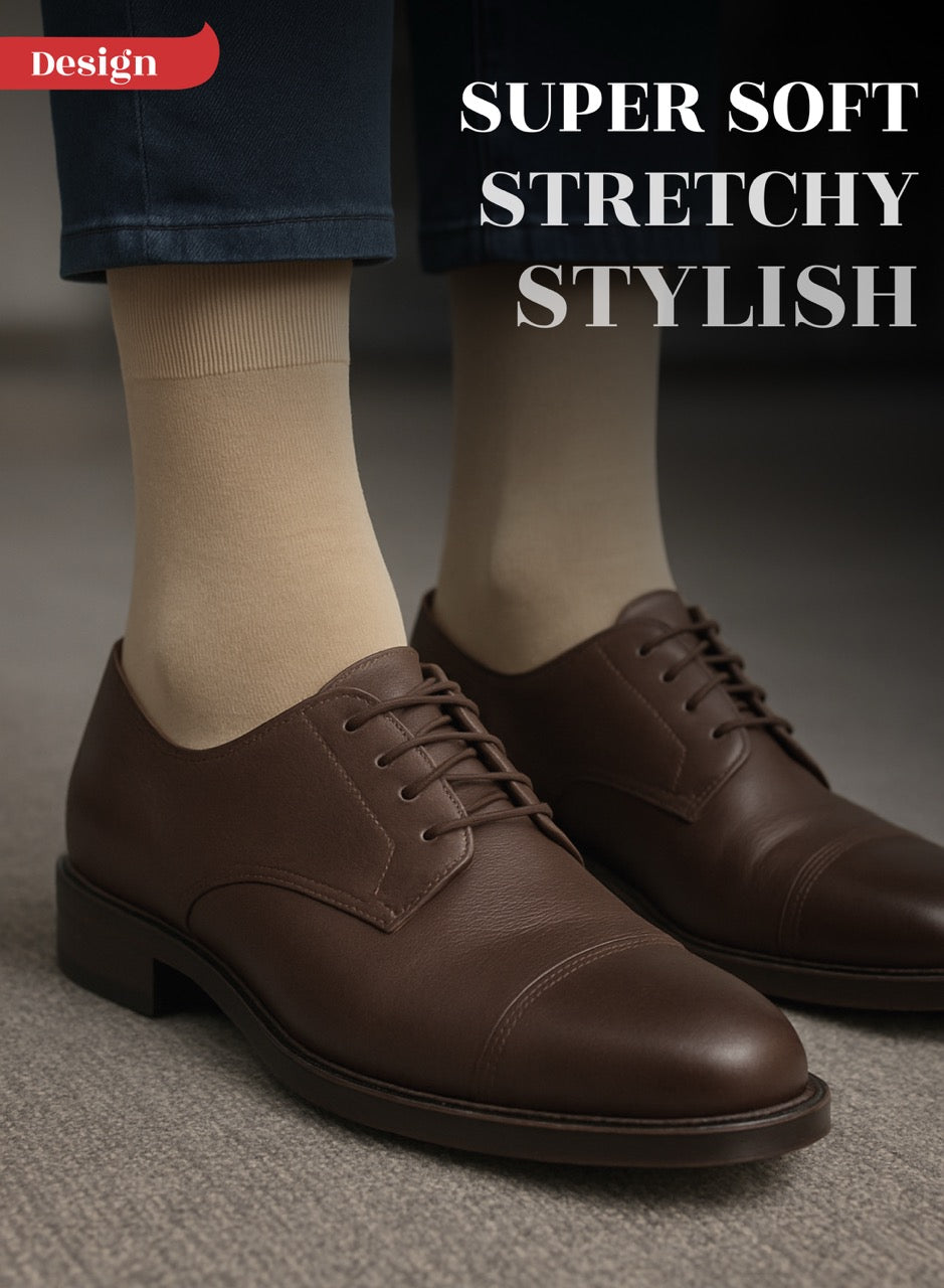 Brown dress shoes with beige socks on a neutral background, text 'Super Soft Stretchy Stylish' above.
