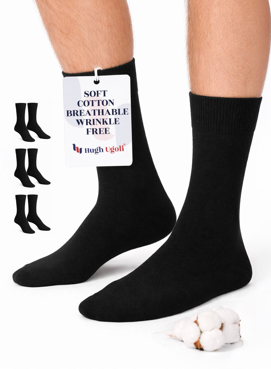 Black socks with a label on a white background