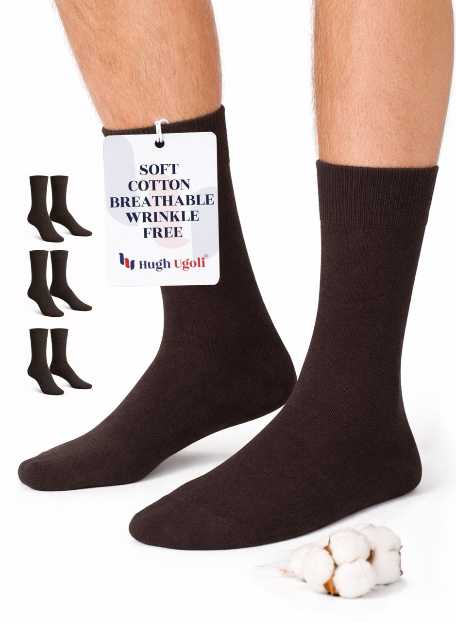 Dark Brown socks with a tag on a white background