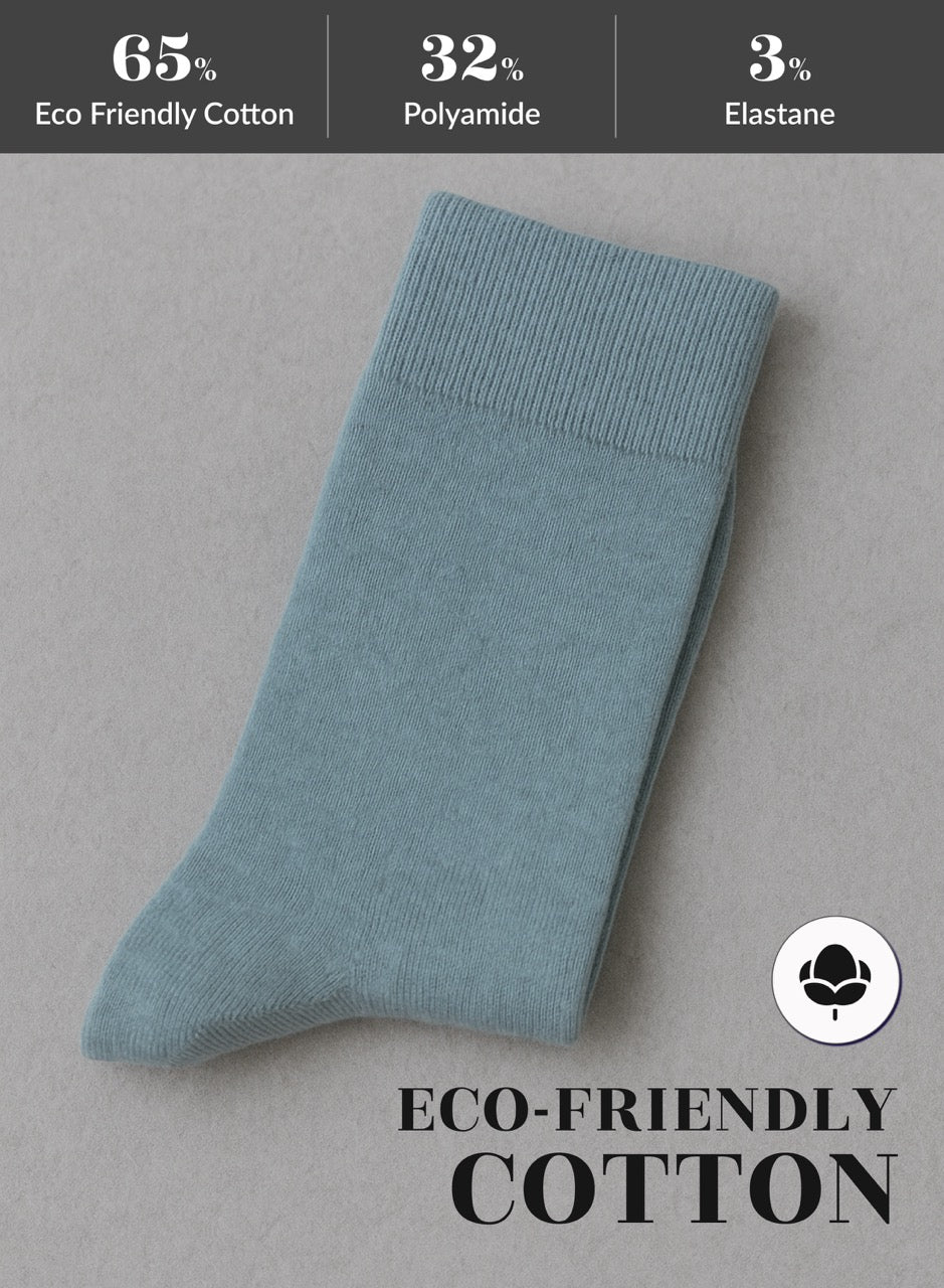 Jeans Blue sock on a gray background with eco-friendly cotton label