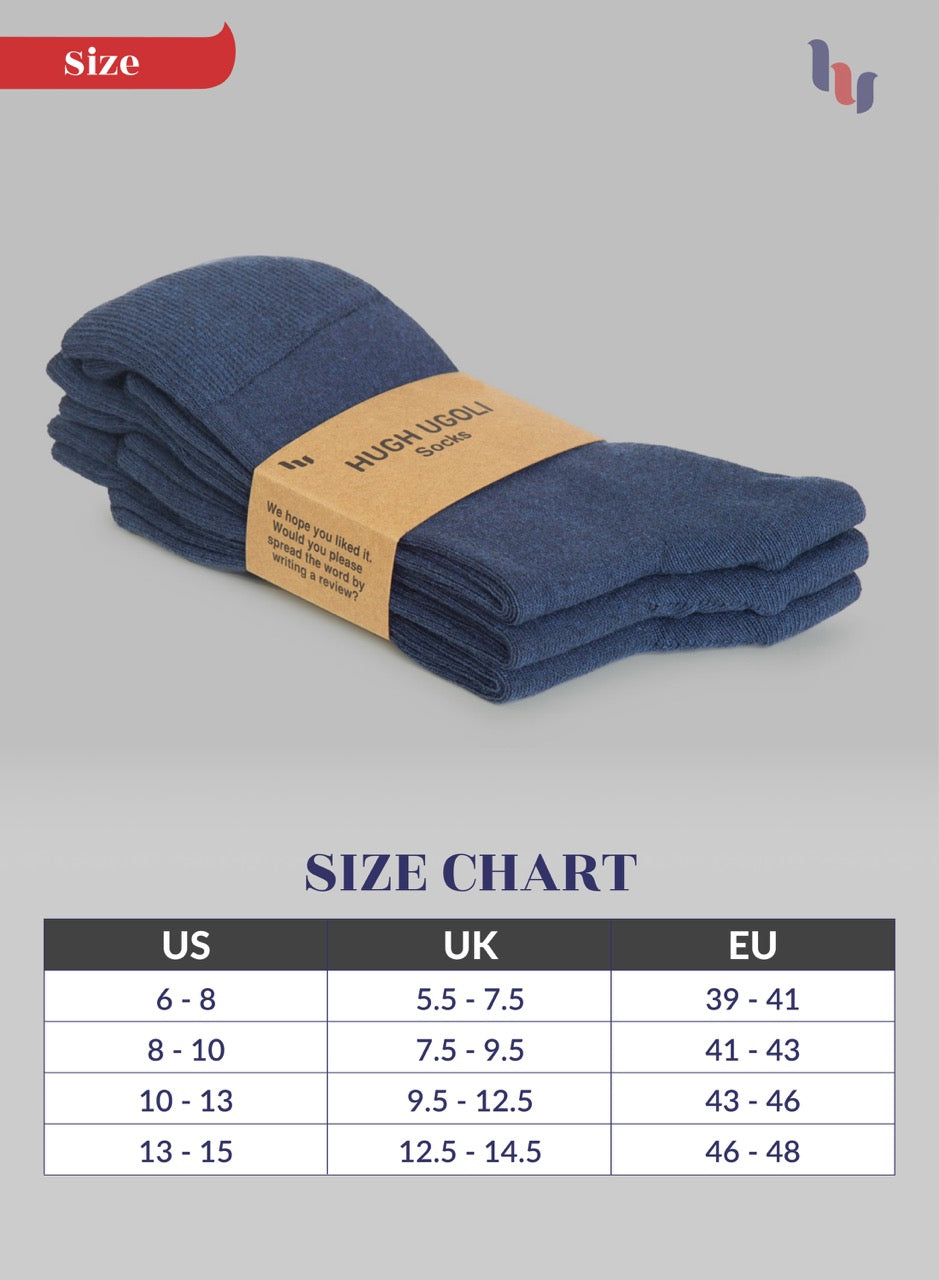 Stack of navy blue socks with a size chart on a gray background