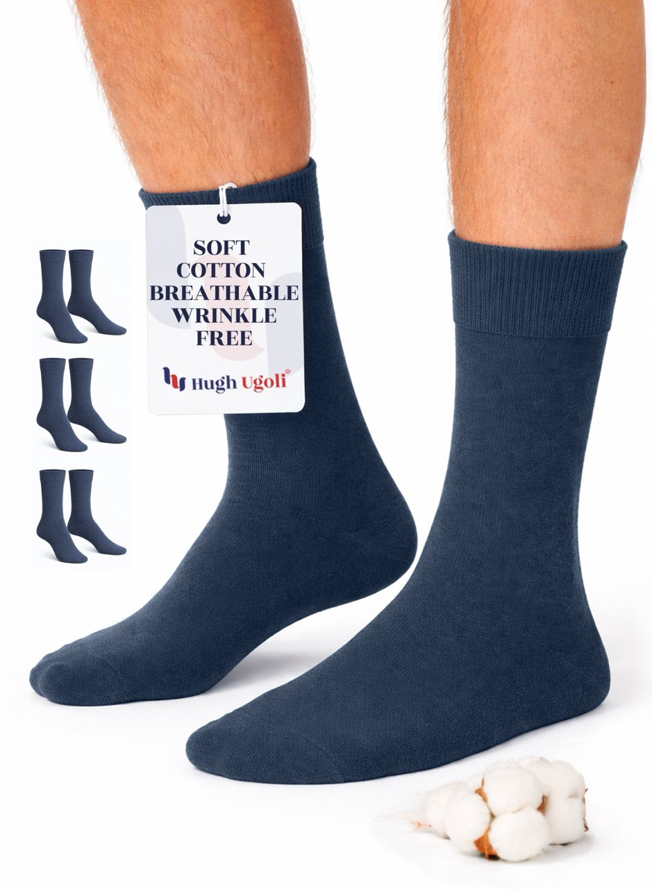 Navy blue socks with a label on a white background