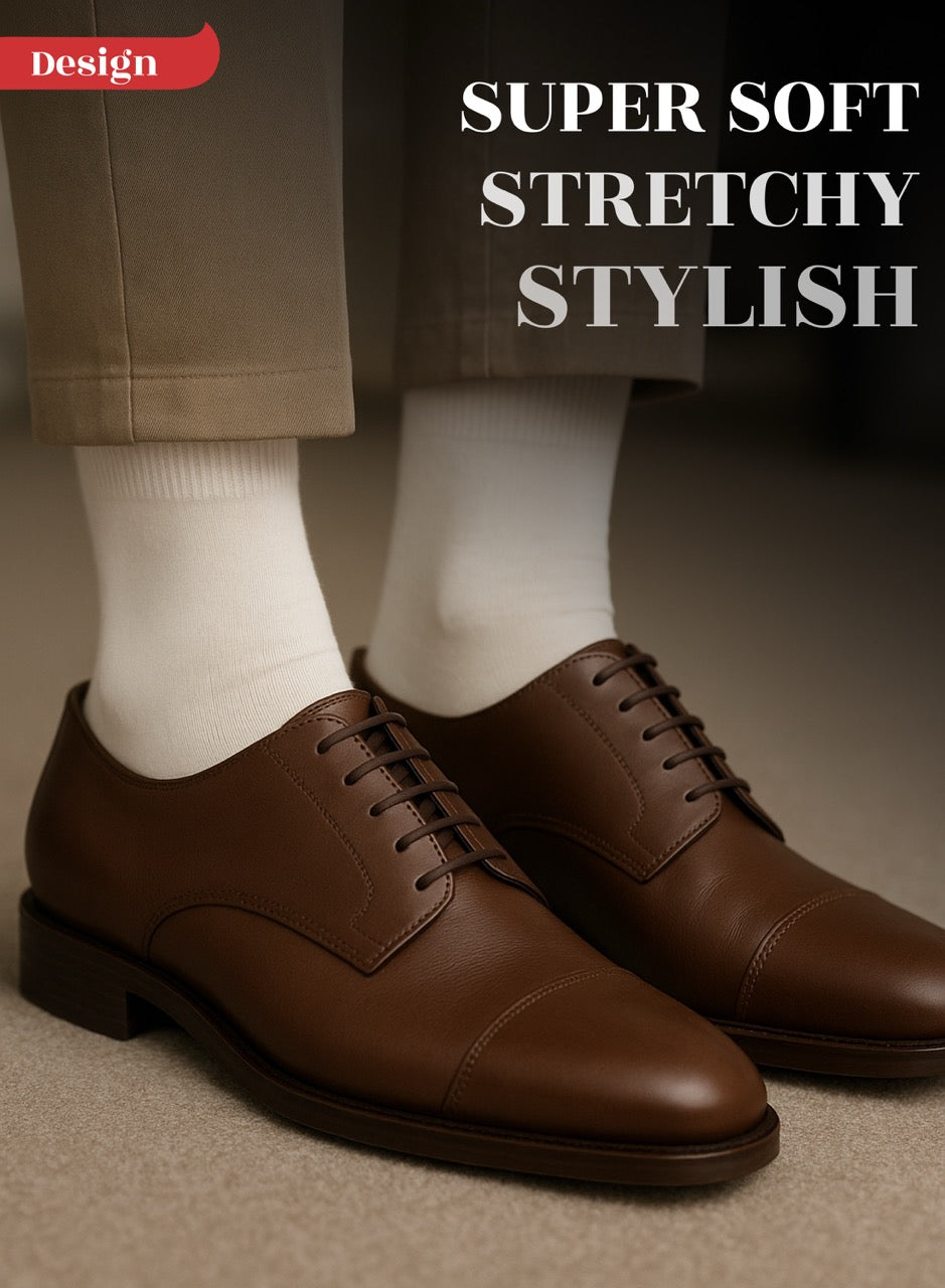 Brown dress shoes worn with white socks and beige pants, text 'Super Soft Stretchy Stylish' on a dark background.
