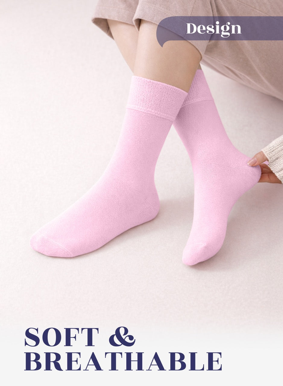 Pink socks worn by a person on a light background with 'Design' and 'SOFT & BREATHABLE' text.