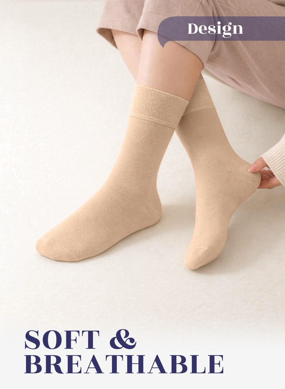 Beige crew socks worn by a person on a light background with 'Design' and 'SOFT & BREATHABLE' text.