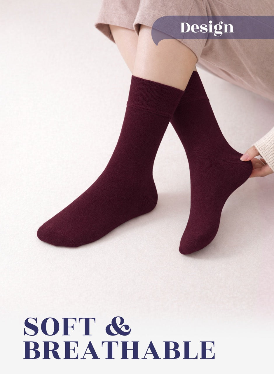 Burgundy socks worn by a person on a light background with 'Design' and 'SOFT & BREATHABLE' text.