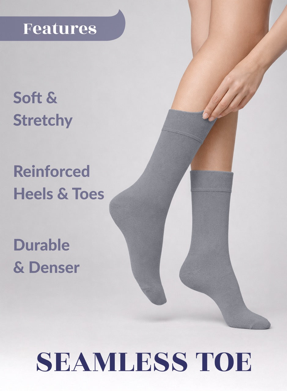 Gray socks with text highlighting features on a light gray background