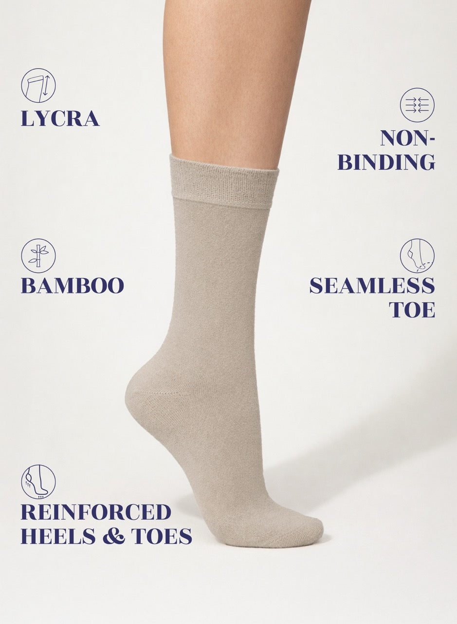 Light Beige sock on a white background with text highlighting features like Lycra, non-binding, bamboo, seamless toe, and reinforced heels & toes.