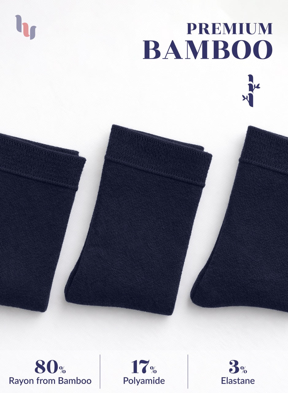 Three pairs of navy blue bamboo socks on a white background with text indicating material composition.