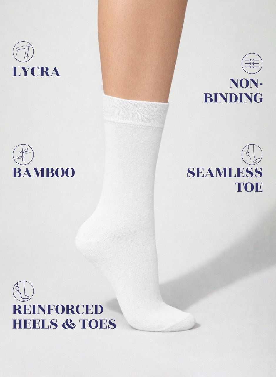 White sock with text highlighting features on a light gray background
