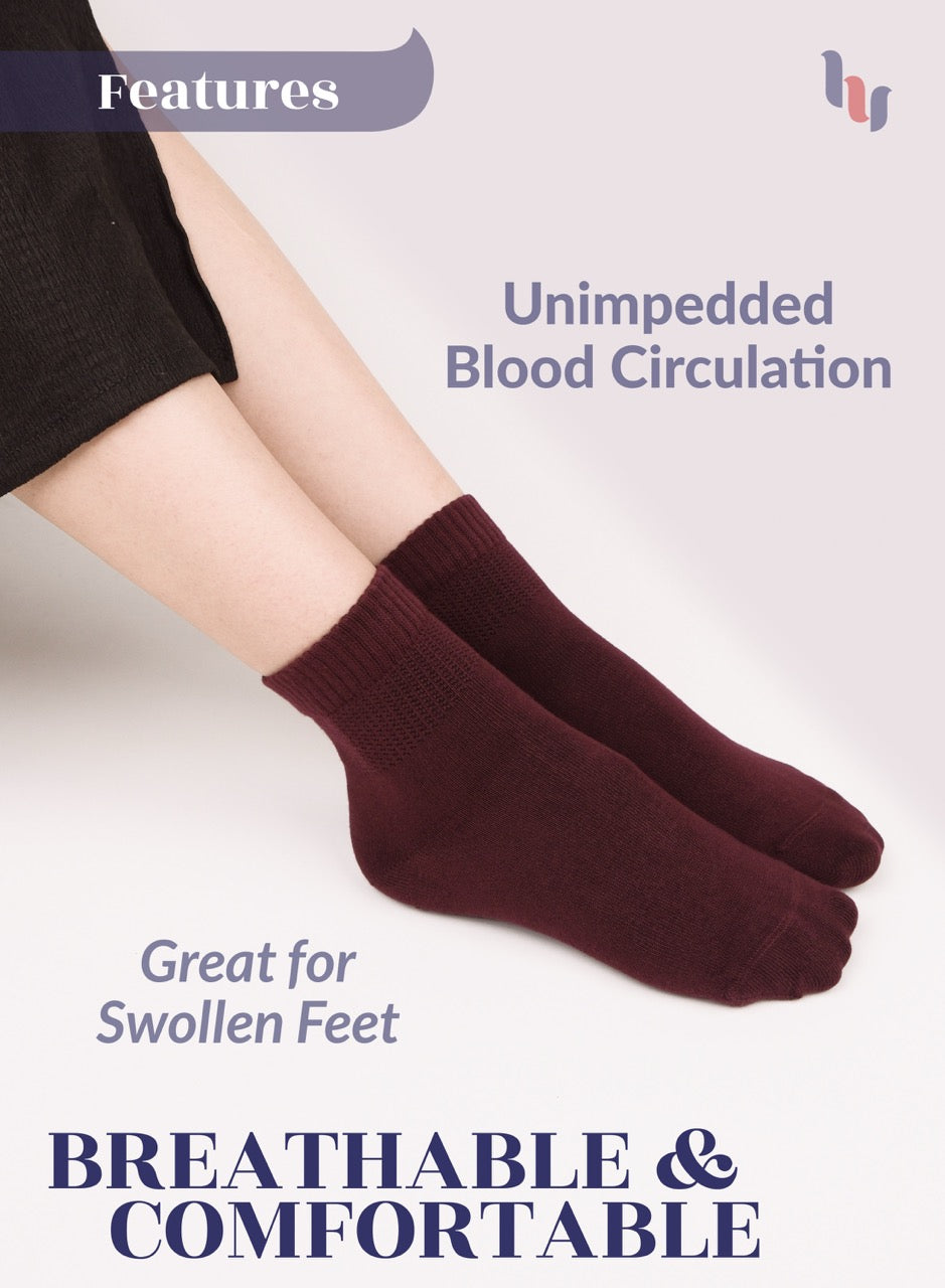 Burgundy socks worn by a person with text highlighting features on a light background