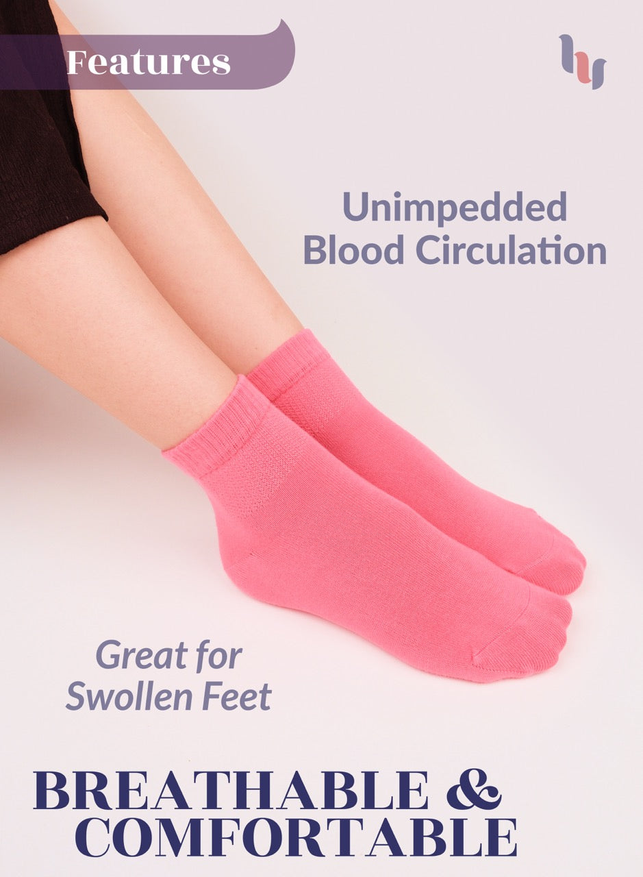 Paradise Pink socks worn by a person with text highlighting features on a light background