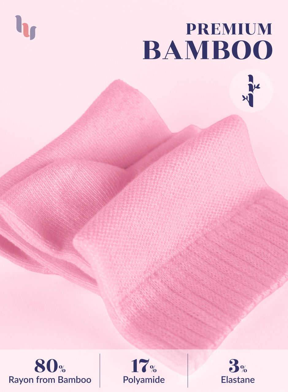 Pink fabric with bamboo text and material composition details on a white background