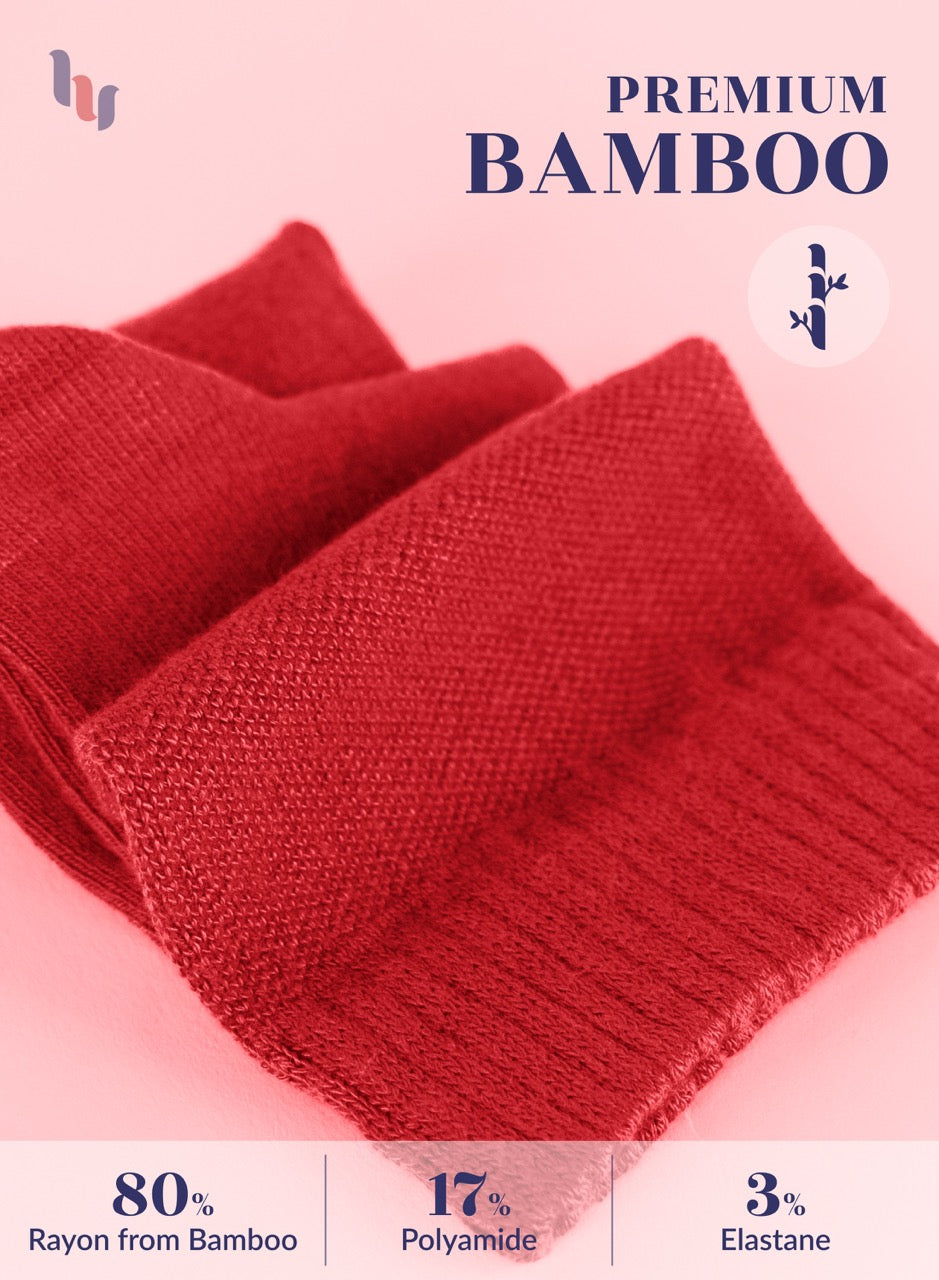 Red knitted fabric with bamboo text and fiber content details on a pink background