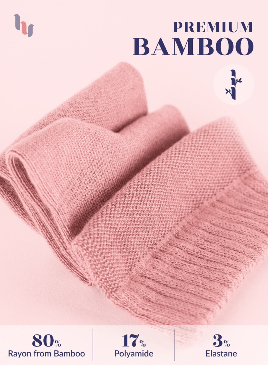 Rose cloud knitted fabric with bamboo text and percentage details on a light pink background