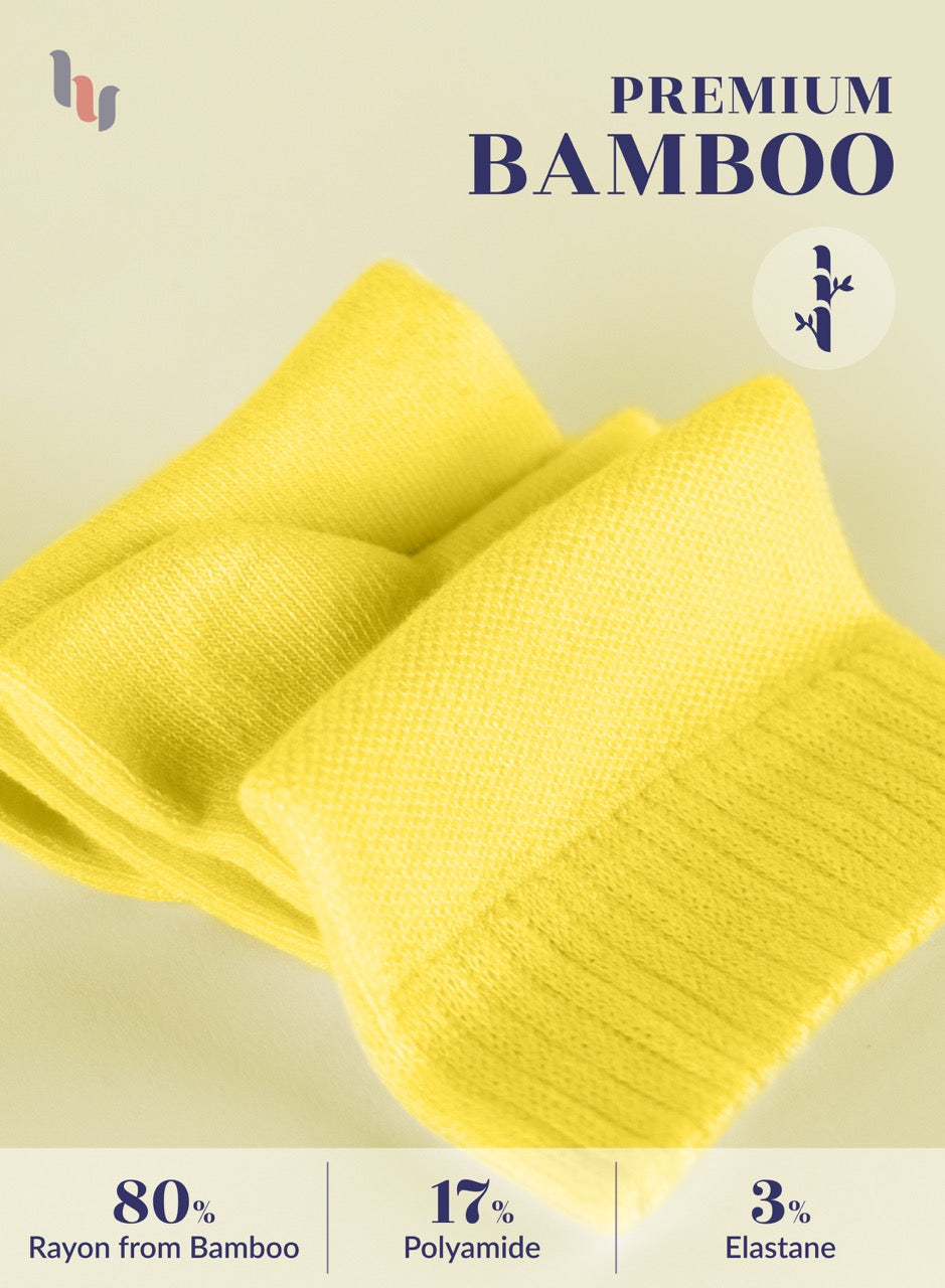 Yellow fabric with bamboo text and material composition on a beige background