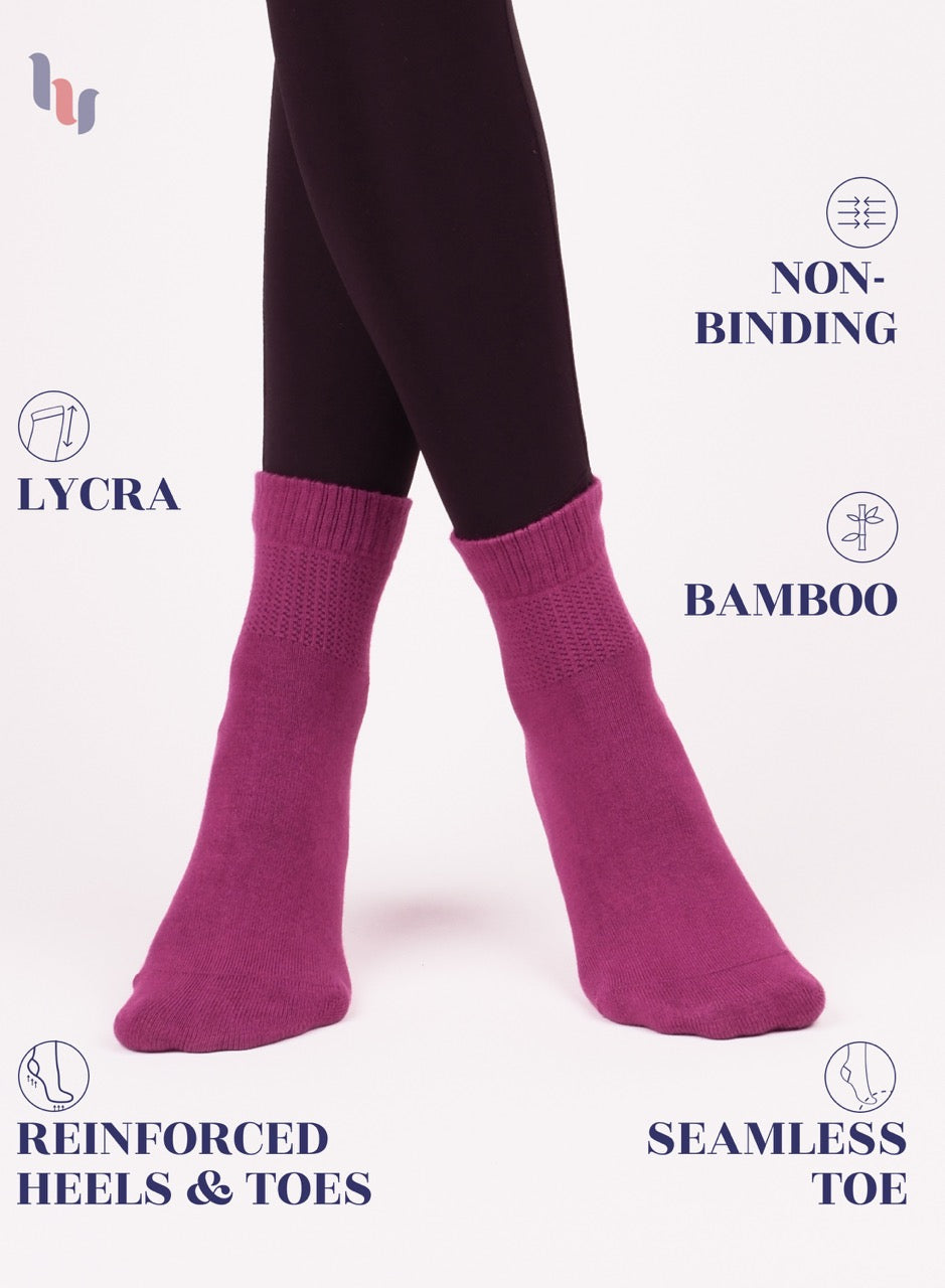 fuchsia socks with text highlighting features on a white background