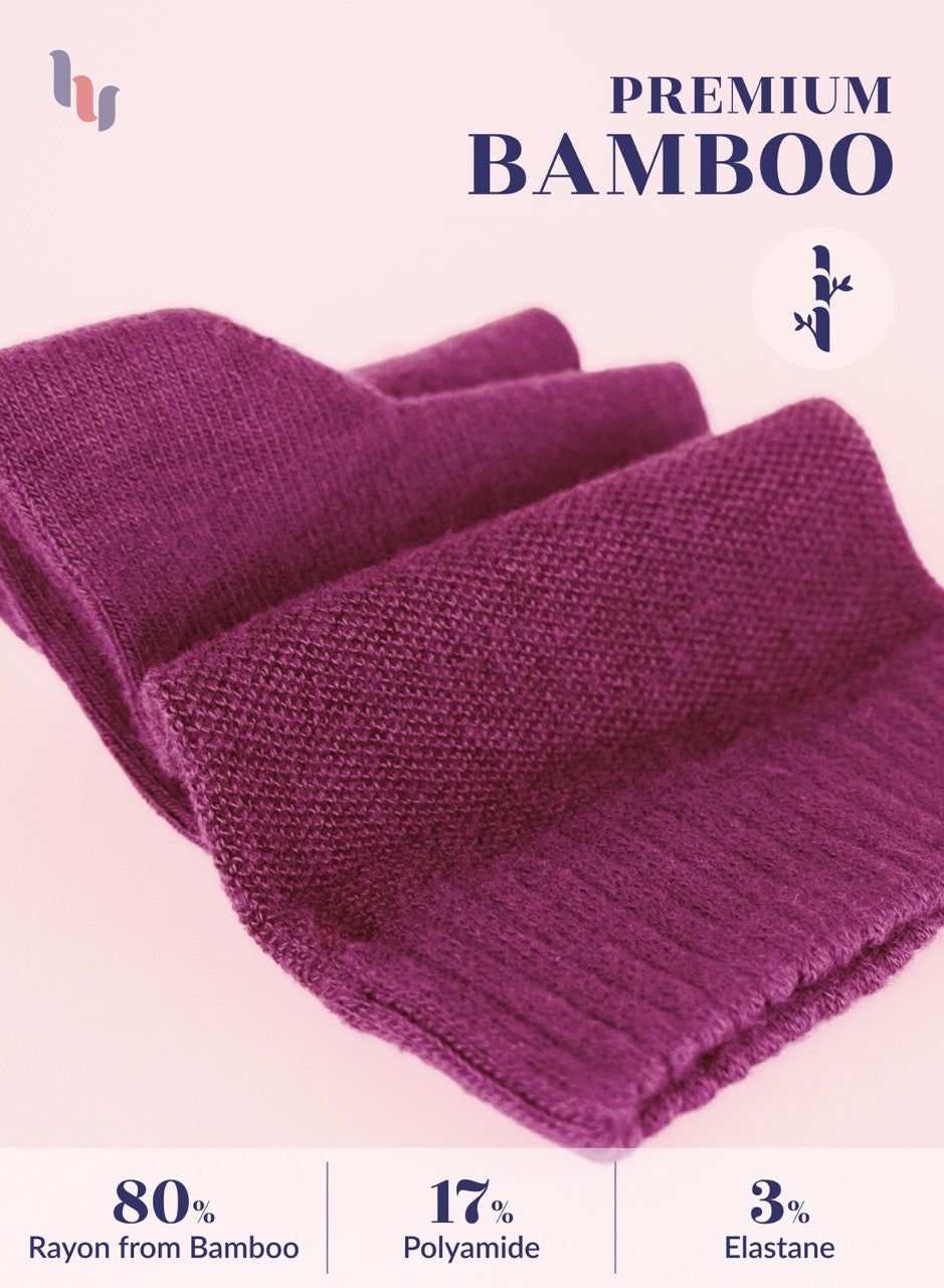 fuchsia knitted fabric with bamboo text and material composition on a light pink background