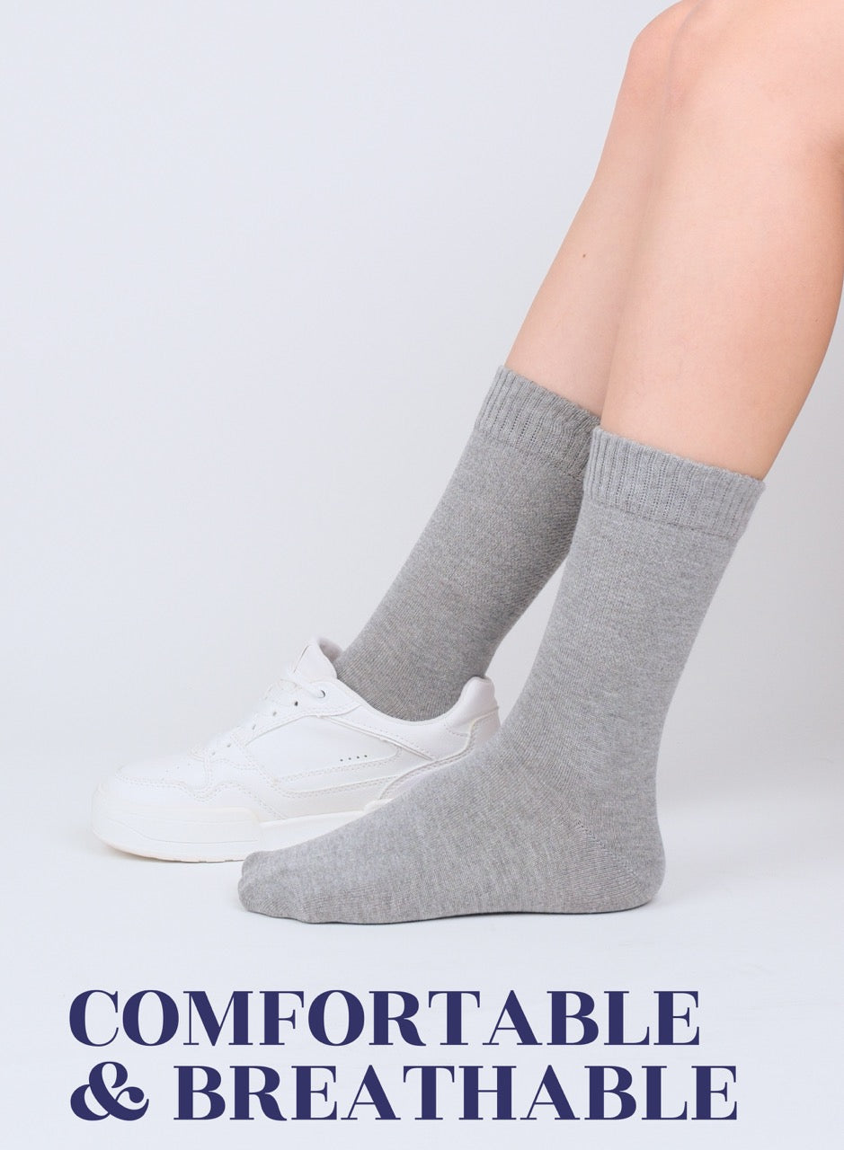 Light Gray socks worn with white sneakers on a light gray background, with text 'COMFORTABLE & BREATHABLE'.