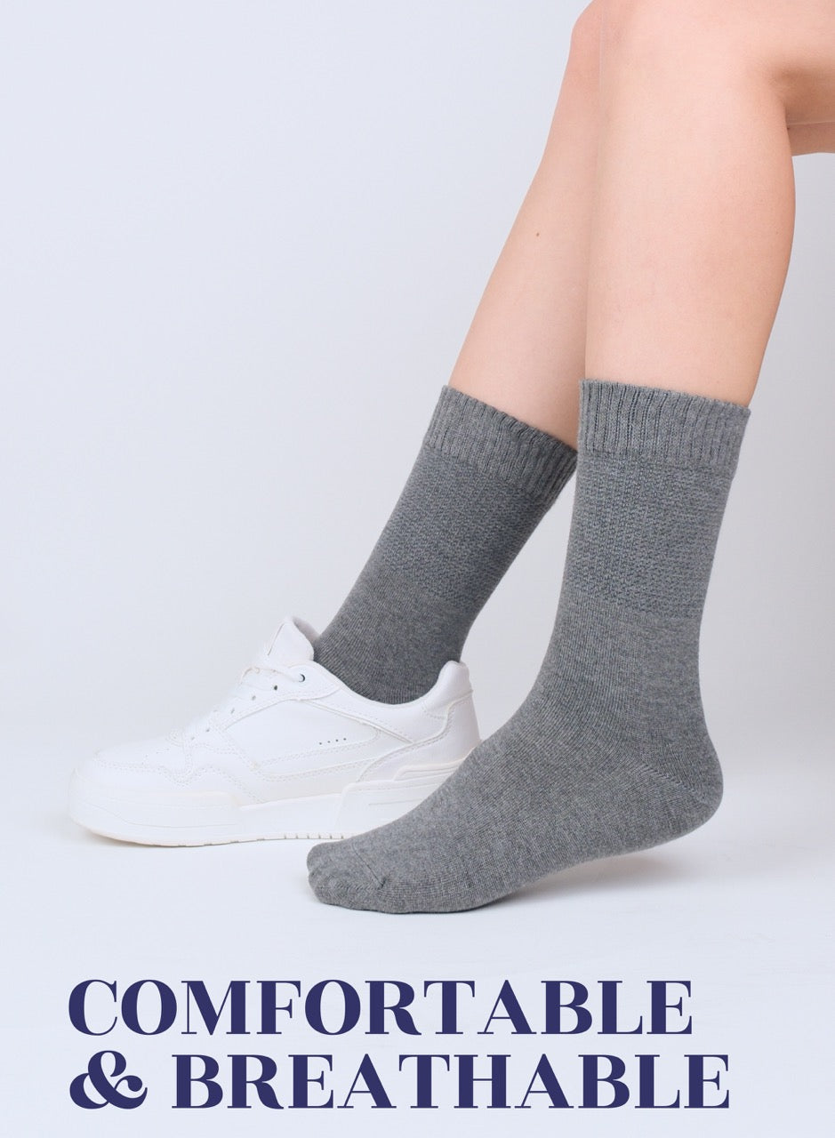 Melange Gray socks worn with white sneakers on a light gray background, with text 'COMFORTABLE & BREATHABLE'.