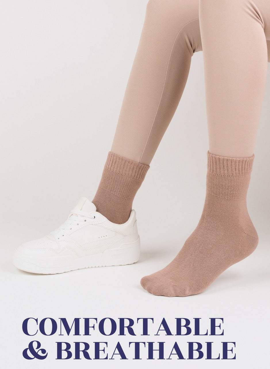 Person wearing Milk Coffee socks and white sneakers on a light background with text 'COMFORTABLE & BREATHABLE'.