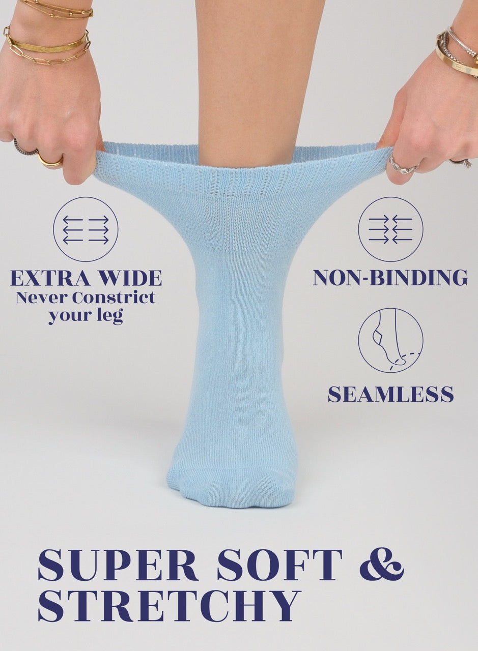 Sky blue sock held by hands with text highlighting features on a gray background