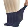 Navy blue socks being worn on a white background