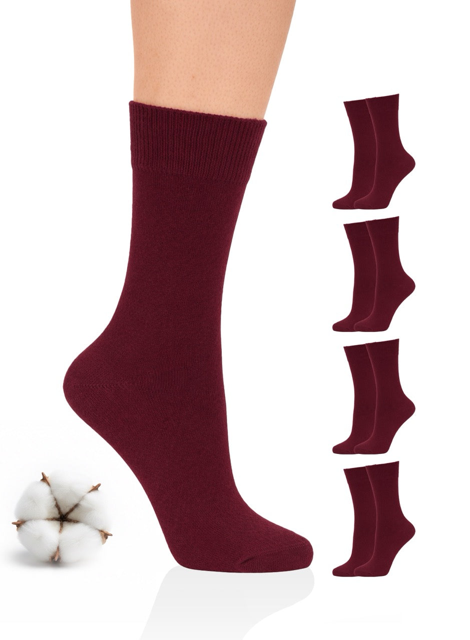 Burgundy socks with additional pairs displayed on a white background, featuring a cotton plant.