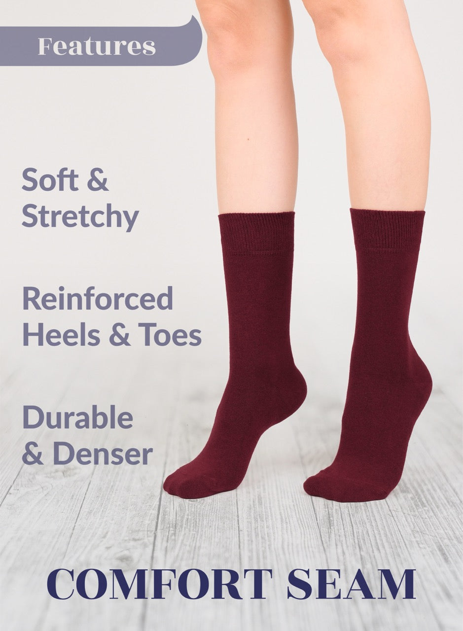 Burgundy socks with text highlighting features on a light gray background