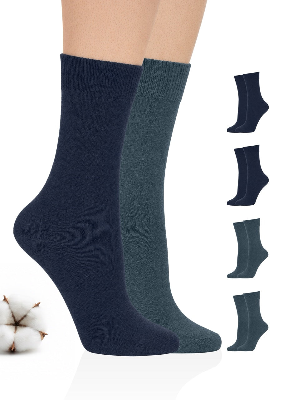 Two pairs of socks in navy and indigo with additional pairs displayed on a white background.
