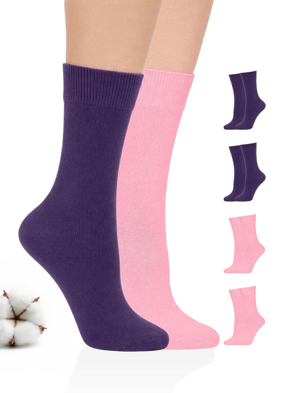Purple and pink socks displayed on a white background with additional pairs shown.