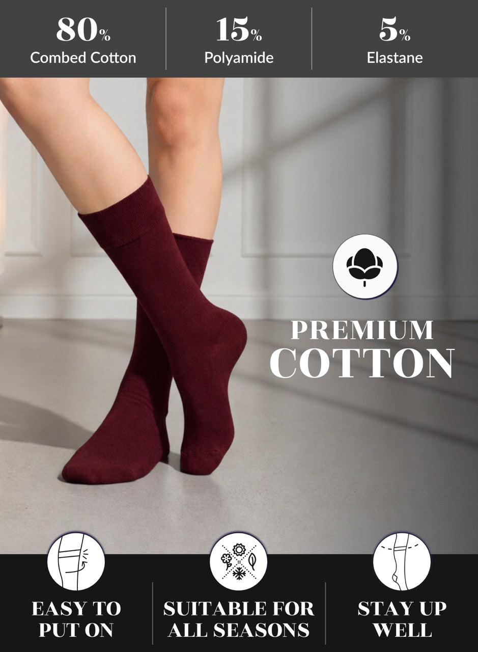 Burgundy socks worn by a person with product details on a gray background