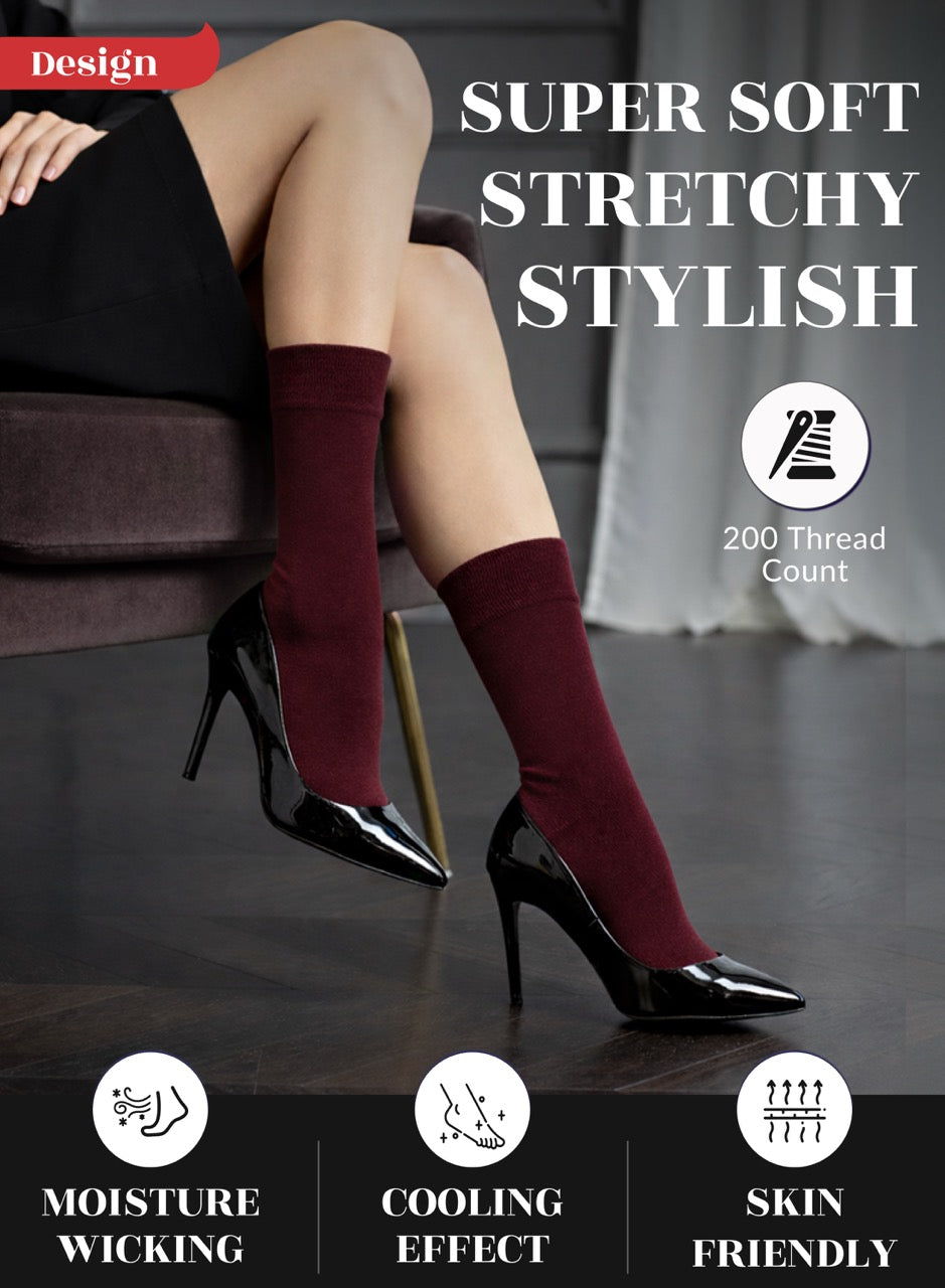 Legs wearing burgundy knee-high socks with text highlighting features on a dark background