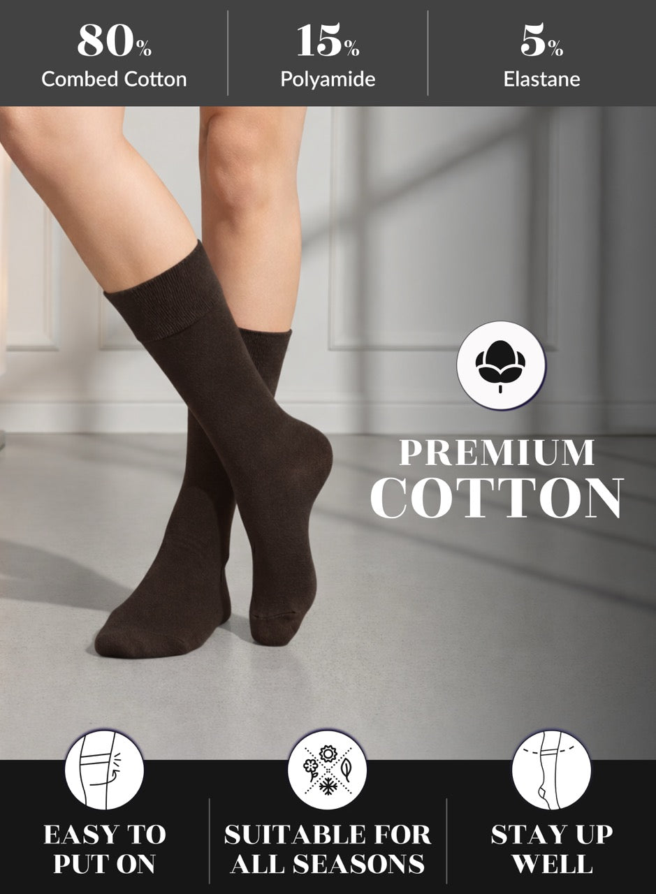 Dark brown socks worn by a person with text on fabric composition and features.